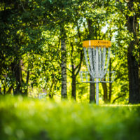 A photo of a hole on the disc golf course at Camp Canaan.