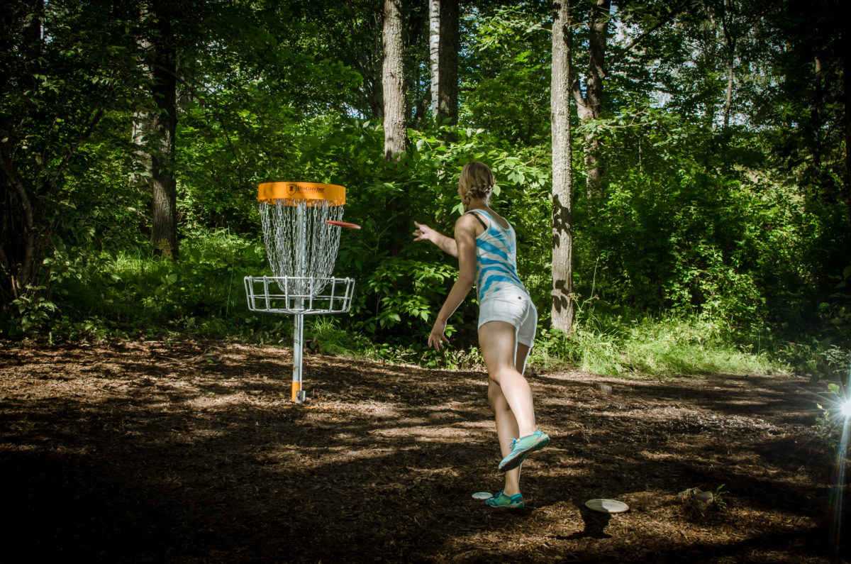 Purchase a Disc Golf Day Pass. 