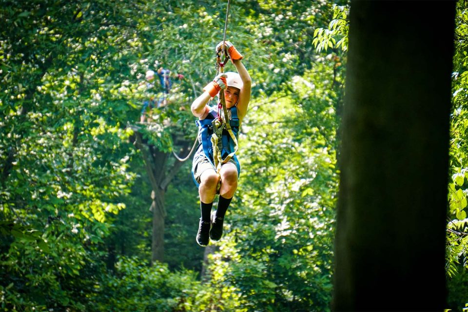 overnight camper ziplines off of zipline canopy tour platform