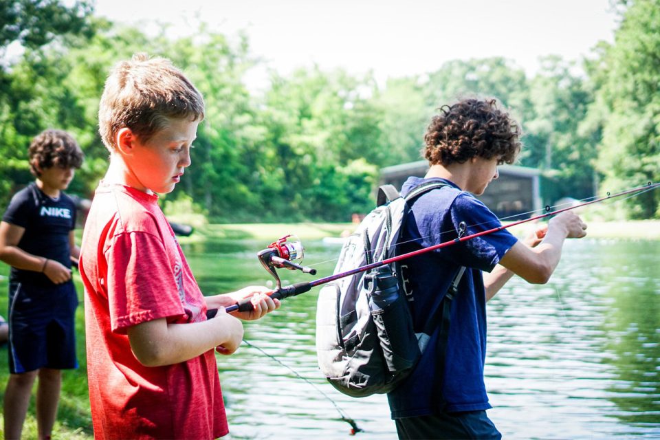 kids fish in Lake Canaan during summer camp